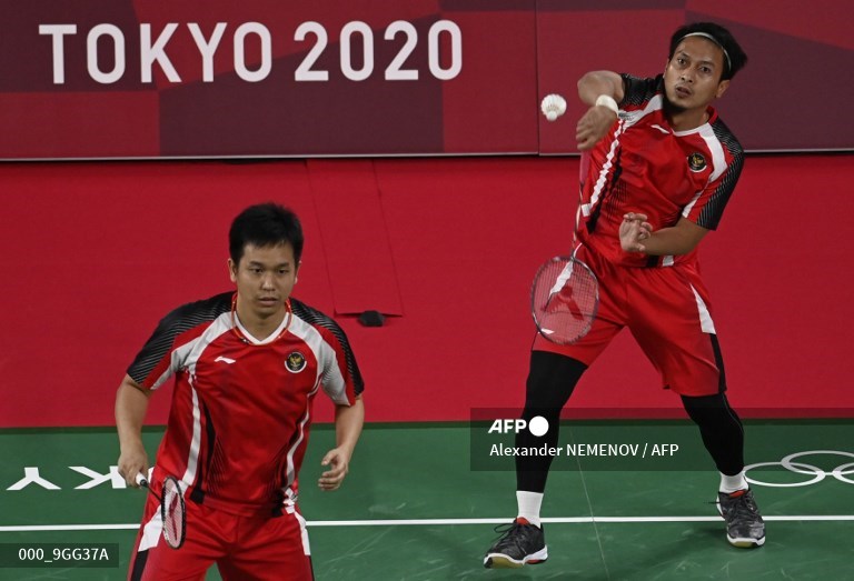 hasilbulubangkis-olimpiadetokyo2020-ahsanhendra-lolos-ke-perempat-final.jpg