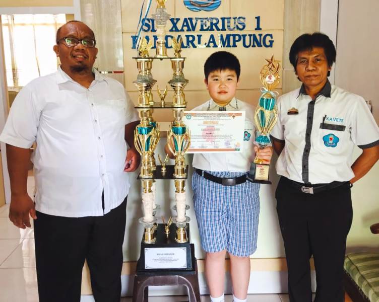 juan-luckyanto-chandra-siswa-sd-xaverius-1-bandar-lampung-sabet-medali-emas-di-ajang-aimo-2020.jpg