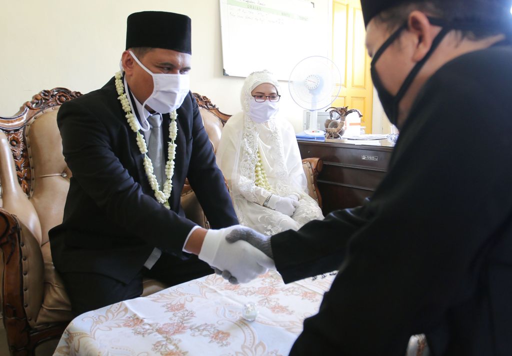 BERITA FOTO Pernikahan Pengantin Bandar Lampung di Tengah Pandemi Corona
