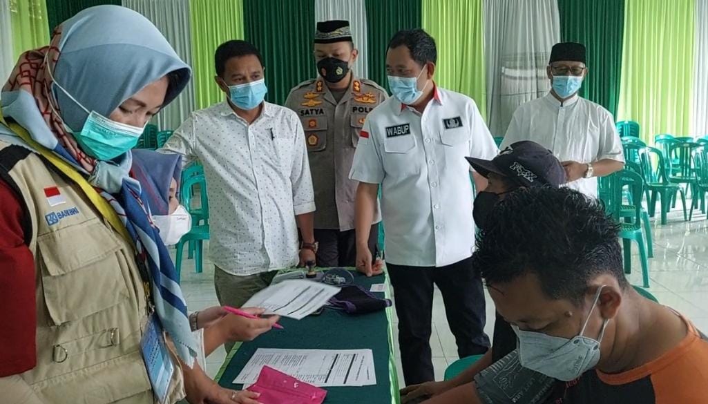 vaksinasi-digelar-gabungan-polres-pcnu-pemkab-tanggamus-di-12-lokasi.jpg