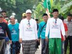 Hari Santri Tubaba Dimeriahkan Jalan Sehat Pakai Sarung, Bupati: Harus Siapkan SDM Unggul
