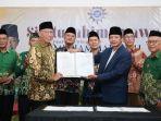 Gubernur-Lampung-Rahmat-Mirzani-Djausal-saat-hadiri-Silaturahmi-Syawal-Muhammadiyah.jpg