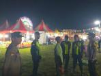 Jajaran-Polsek-Seputih-Raman-saat-melaksanakan-patroli-di-pasar-malam.jpg
