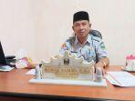 Kepala-BPBD-Pesisir-Barat-Mirza-Sahri-mengimbau-masyarkat-waspada-bencana.jpg