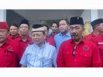 Pasangan-Dawam-Ketut-usai-mendafatar-di-KPU-Lampung-Timur.jpg