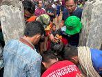 Proses-evakuasi-dua-korban-tewas-dari-dalam-sumur-di-Pringsewu.jpg