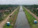 Petani di Tulangbawang Semringah, Saluran Irigasi Gantung Efesien Mengairi Sawah, Airnya Lancar