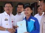 bupati-pesisir-barat-agus-istiqlal-sertifikat-tanah-ptsl.jpg
