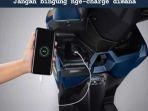 fitur-USB-charger-yang-memungkinkan-pengguna-mengisi-daya-ponsel.jpg