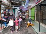 hari-ketiga-lebaran-banyak-warga-bandar-lampung-datangi-kedai-makanan-dan-toko-di-lorong-king.jpg