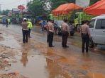 jalan-licin-di-cileungsi-bogor.jpg