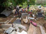 jenazah-yang-terangkat-dari-kubur-ditemukan-di-atas-pohon-keesokan-hari-bpbd-sebut-akibat-sampah.jpg