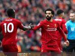 mohamed-salah-dan-sadio-mane-berusaha-saling-berjabat-tangan-usai-terciptanya-gol.jpg