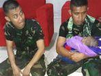 prajurit-tni-selamatkan-bayi-dari-banjir-bandang-sentani.jpg