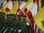 ramzi-haidar-afpanggota-hezbollah-dalam-sebuah-parade.jpg