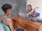 tersangka-Adji-Darma-Saputra.jpg