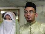 ustaz-mohd-razis-ismail-foto-bersama-salah-satu-istrinya_20160301_162059.jpg