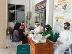 vaksinasi-massal-covid-19-di-universitas-muhammadiyah-metro.jpg