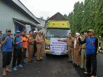 wakil-bupati-tanggamus-hi-am-syafii-melepas-bantuan-beras-untuk-korban-banjir.jpg