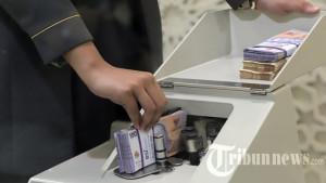 nilai-tukar-rupiah-menguat-tipis_20231228_213026.jpg