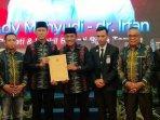 Ady-Mahyudi-dan-dr-Irfan-saat-ditetapkan-oleh-KPU-Kabupaten-Bima.jpg
