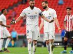 Penyerang-Prancis-Real-Madrid-Karim-Benzema-dan-gerakan-bek-Spanyol-Real-Madrid-Nacho-Fernande.jpg