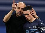 Pep-Guardiola-kiri-menggantung-gelandang.jpg