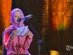 aksi-syafira-milenia-saat-membacakan-puisi.jpg