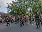 barisan-taruna-akademi-militer-saat-kirab-di-jalan-pejan.jpg