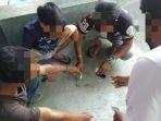 ditangkap-dua-orang-kurir-narkoba-duduk-tertangkap-membawa-narkoba.jpg