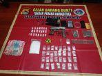 dua-orang-pelaku-yang-diduga-bandar-dan-pengecer-narkoba-di-kota-bima-yang-ditangkap.jpg