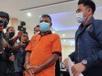 pelaku-berinisial-mta-di-hadapan-polisi.jpg
