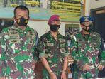 pria-s-tengah-anggota-tni-al-gadungan-diapit-dua-anggota-tni-al.jpg