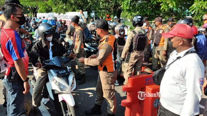 pemeriksaan-pengendara-yang-memasuki-wilayah-jembatan-suramadu-sisi-surabaya-minggu-662021.jpg