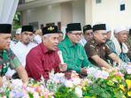 Bupati-Pamekasan-Baddrut-Tamam-saat-menghadiri-acara-peringatan-hari-lahir-harlah.jpg