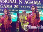 Chandra-Kirana-guru-MAN-2-Pamekasan-saat-menerima-juara-3-guru.jpg
