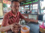 Harjono-penjual-mi-ayam-bakso-terpaksa-menggunakan-campuran-cabe-rawit-merah-dan-dan-hijau.jpg