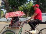 Hendy-Siswanto-ngontel-becak-saat-kampanye-di-Semboro-Jember.jpg