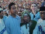 KH-Suyuti-Toha-saat-mendampingi-cawapres-Gibran-Rakabuming-Raka-di-Banyuwangi.jpg