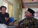 Ketua-Bawaslu-Sampang-Muhalli-saat-menjelaskan.jpg