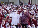 PW-Muhammadiyah-Jatim-Dr-Sukadiono-dengan-Gubernur-Jawa-Timur-Khofifah-Indar-Parawansa.jpg