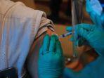 Pelaksanaan-vaksinasi-Covid-19-di-Surabaya-beberapa-waktu-lalu-Mengantisipasi.jpg