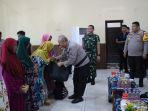 Polres-Pameksan-bersama-Kodim-0826-Pamekasan-menggelar-bakti-sosial.jpg