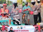 Polwan-Polres-Sumenep-bagikan-ratusan-nasi-kota-bagi-abang-becak.jpg