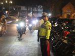 RAMADAN-2025-Suasana-saat-personel-Polres-Pamekasan-Madura-menjaga-arus.jpg