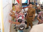 Tokoh-Ulama-Bangkalan-KH-Imron-Fattah-dalam-Penandatangan-Pakta-Integritas-Stop.jpg