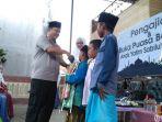 akbp-boby-paludin-tambunan-memberikan-bingkisan.jpg
