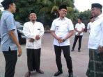 anggota-komisi-c-fraksi-pdi-perjuangan-dprd-jatim-mahfud-dan-bupati-bangkalan.jpg