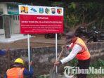 aparat-gabungan-memasang-papan-larangan-penambangan-pasir-di-aliran-sungai-brantas-tulungagung.jpg