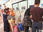 check-in-melalui-mesin-cetak-tiket-mandiri-dibandara-juanda.jpg